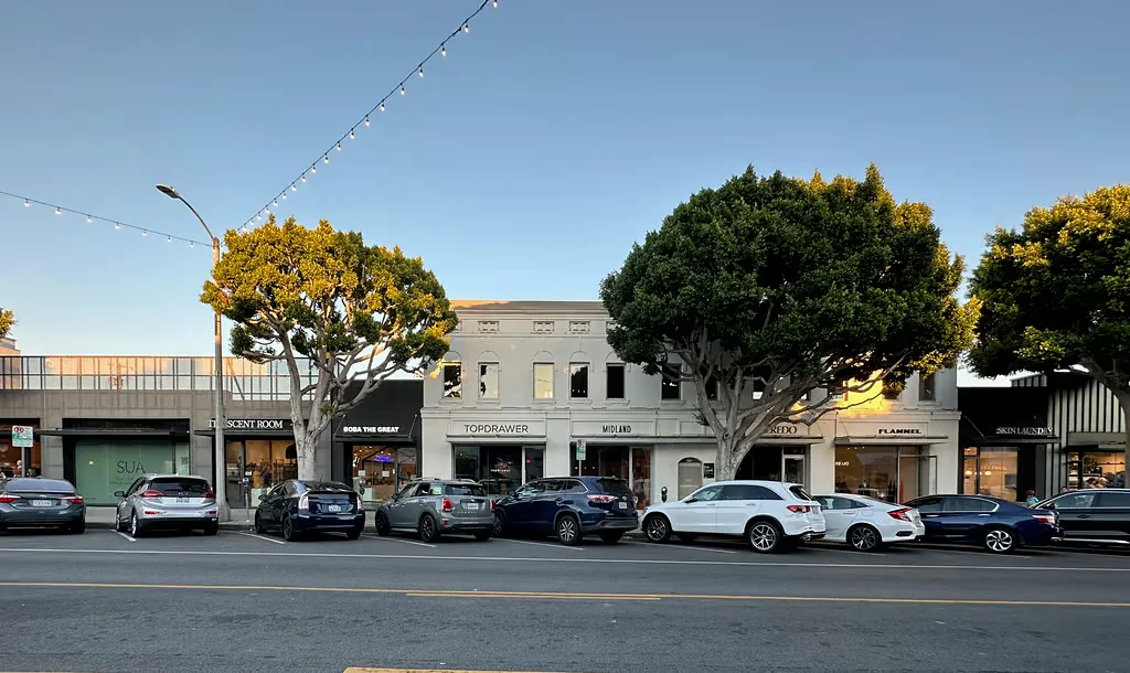 Larchmont Boulevard, Los Angeles — an established low-rise retail block beneath mature street trees