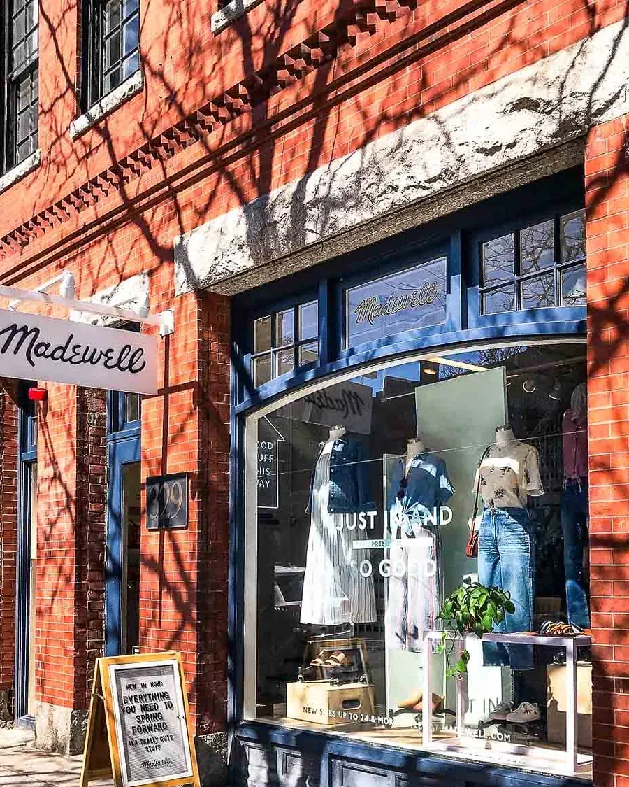 Madewell storefront in a brick building on Newbury Street, Boston